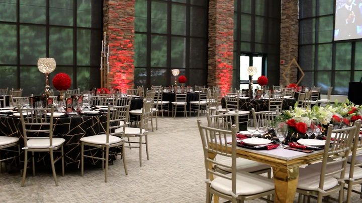 The gala room set with red roses and gold chairs