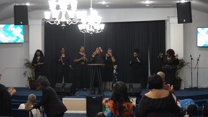The worship team on stage during a weekly livestream