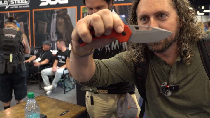 Testing a knife at a booth