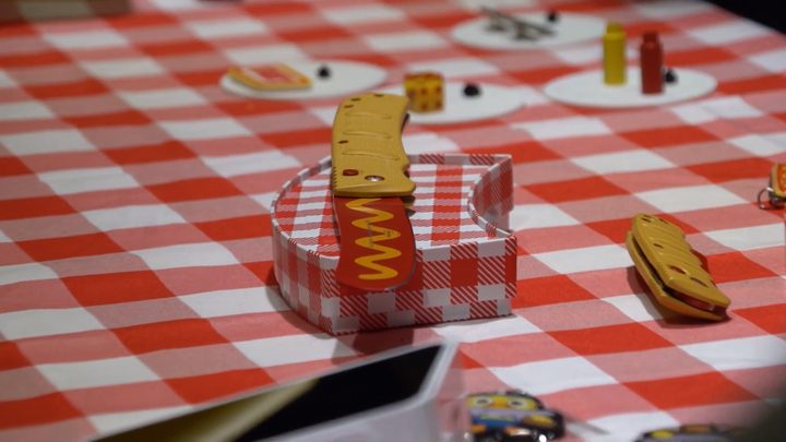 Styled product shot of a knife on a picnic table