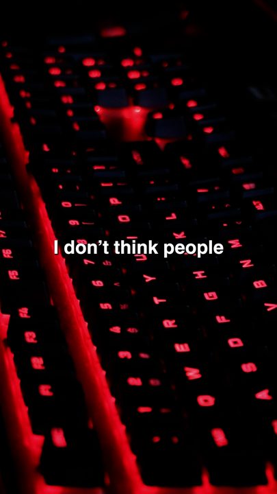 A red-lit keyboard in a dark edit suite