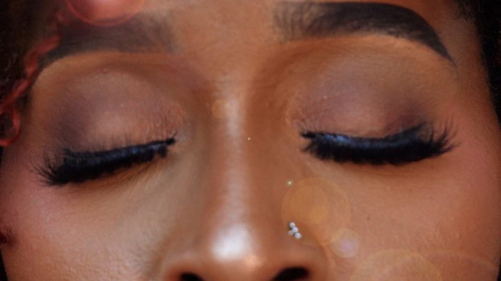 An extreme close-up of closed eyes and lashes